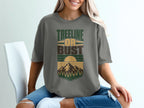 Gray t-shirt with "Treeline Or Bust" text and mountain sunset graphic.