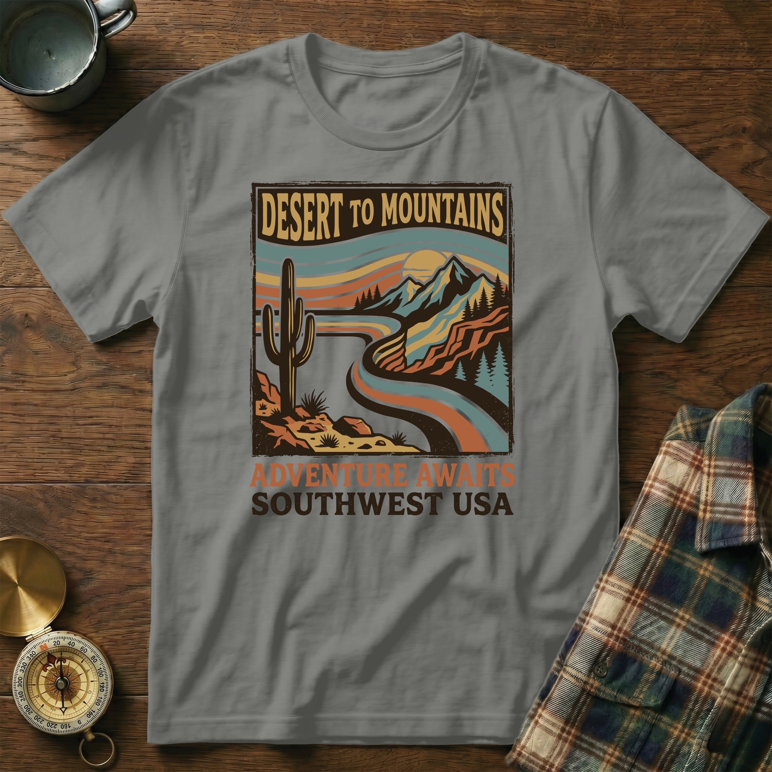 Desert to Mountains Southwest USA graphic t-shirt with cactus and mountain scene.