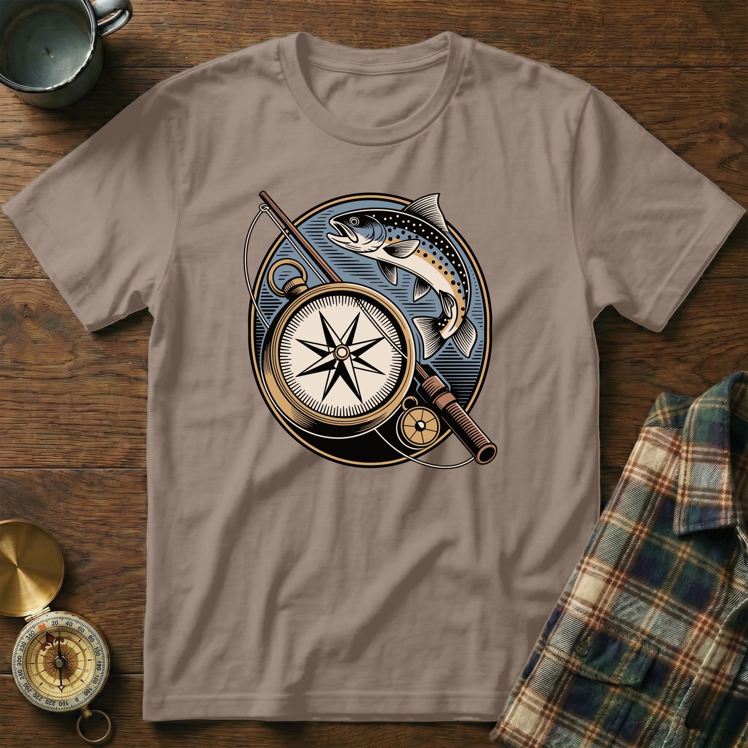 T-shirt with vintage compass, fishing rod, and trout graphic.