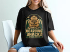 A cartoon marmot holds acorns and nuts. Text reads "Hoarding Snacks Since Birth".