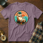 Purple t-shirt with a cartoon cocktail glass lounging on a beach.