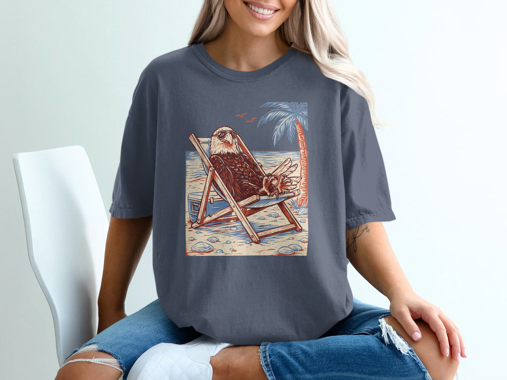 Bald eagle wearing sunglasses relaxes in a lounge chair on a beach with a palm tree.