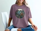 T-shirt featuring a circular ocean scene with a starfish and coral.