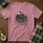Bald eagle wearing sunglasses relaxes on an inflatable ring, holding a drink.