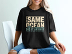 Black t-shirt with text "BAD DAY SAME OCEAN DID IT ANYWAY YOU KNOW THE DEAL".