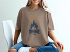 Brown t-shirt with a blue and orange campfire graphic.