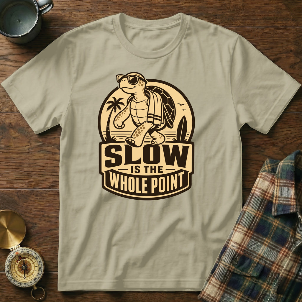 T-shirt with a turtle graphic and the text "SLOW IS THE WHOLE POINT".