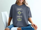T-shirt with "Coast," "Too Hot?", "Mountain," and "Problem Solved" flowchart.