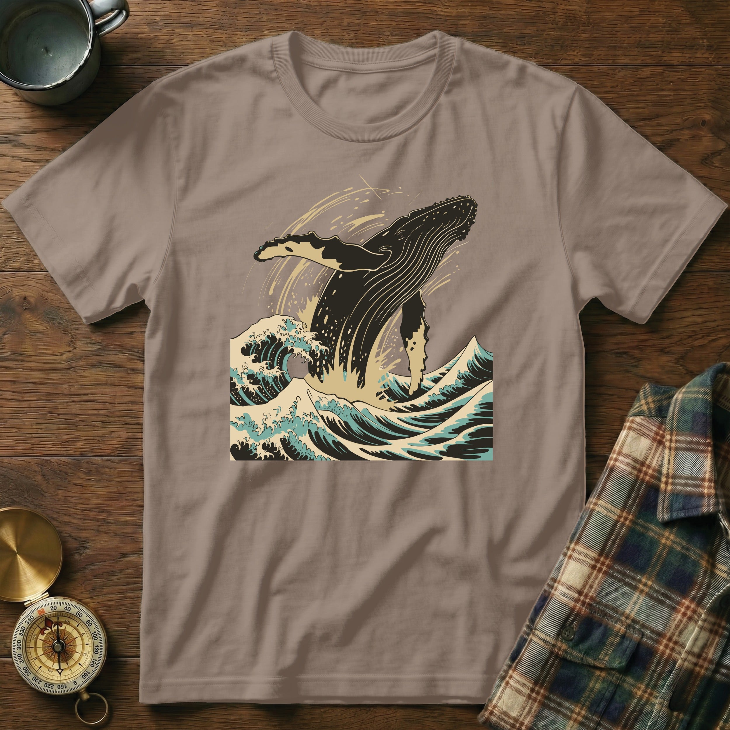 T-shirt with humpback whale breaching in crashing ocean waves, in a retro style.