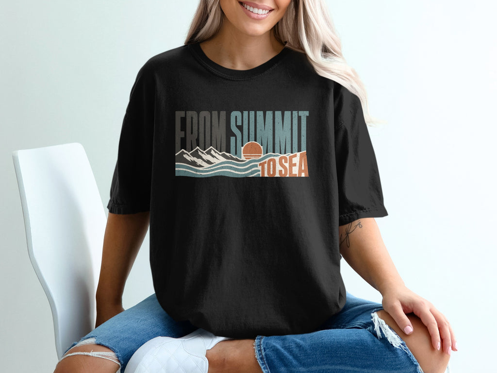 Black t-shirt with "From Summit to Sea" text and mountain and ocean graphic.