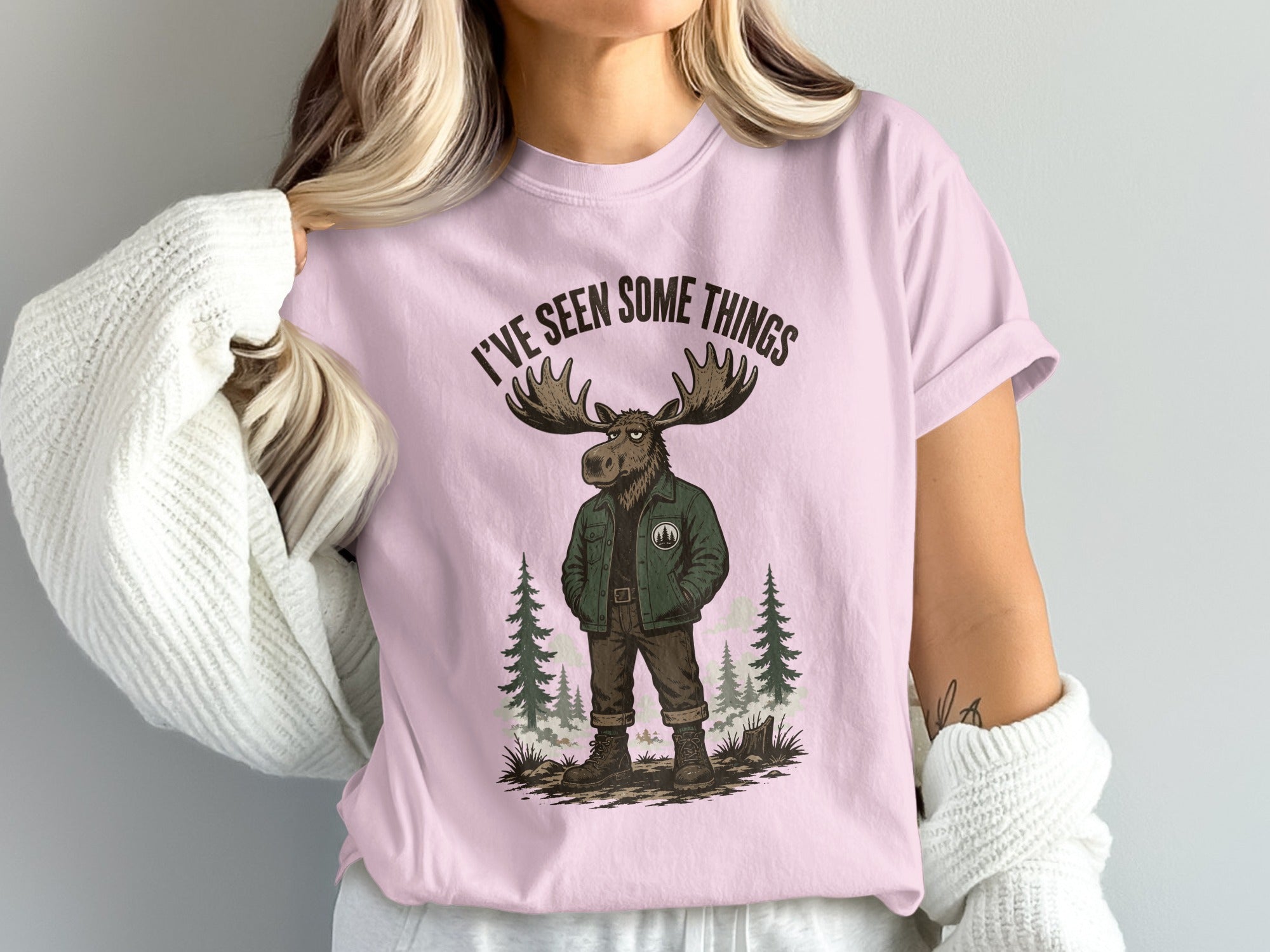 Pink t-shirt with cartoon moose graphic and text "I'VE SEEN SOME THINGS."