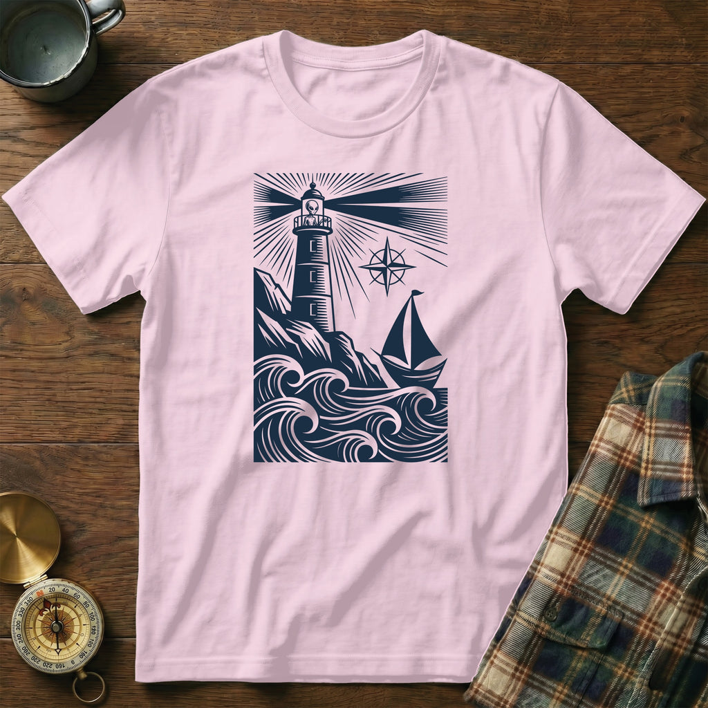 Pink t-shirt with a dark blue lighthouse, sailboat, and waves design.