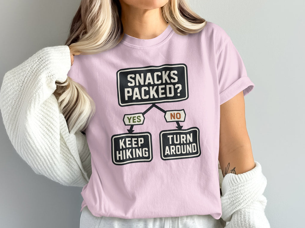 Pink t-shirt with "Snacks Packed?" flowchart and hiking humor.