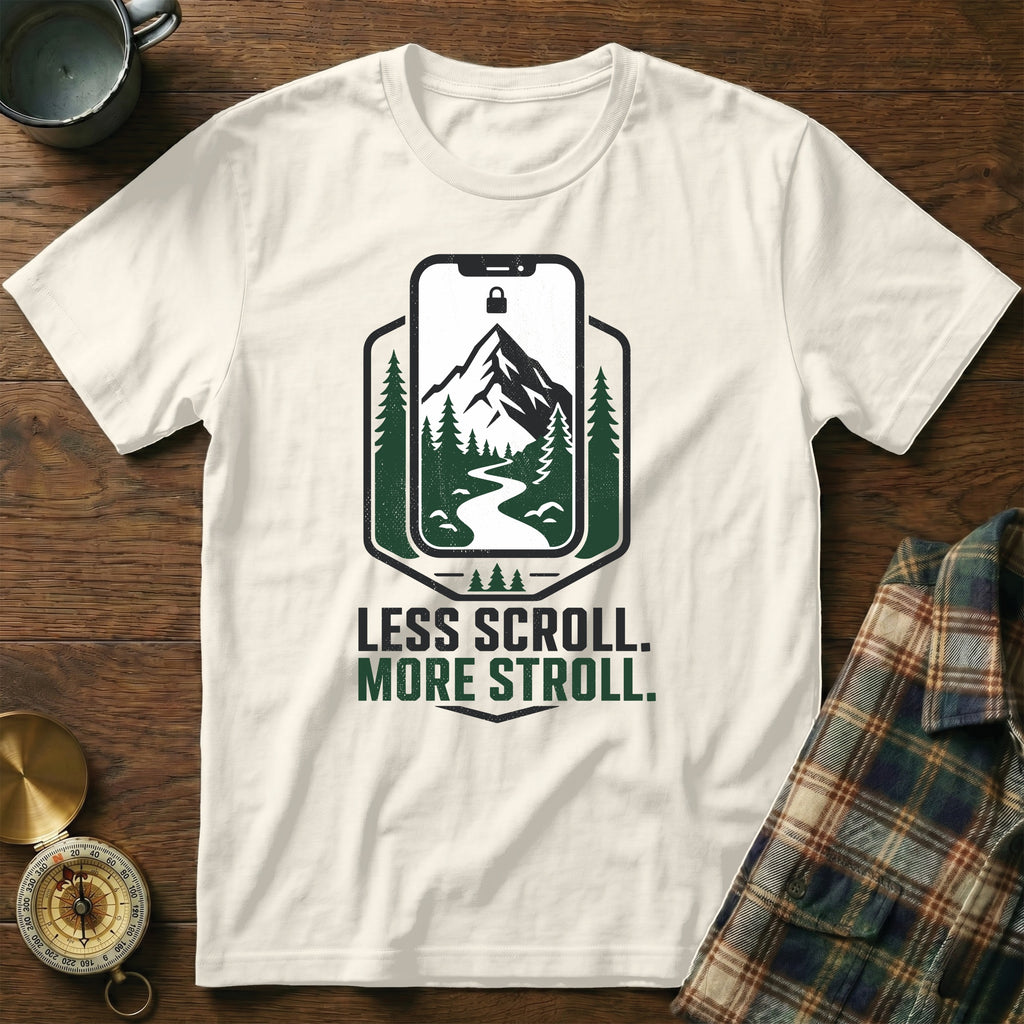 Cream t-shirt with "Less Scroll. More Stroll." and phone screen landscape graphic.