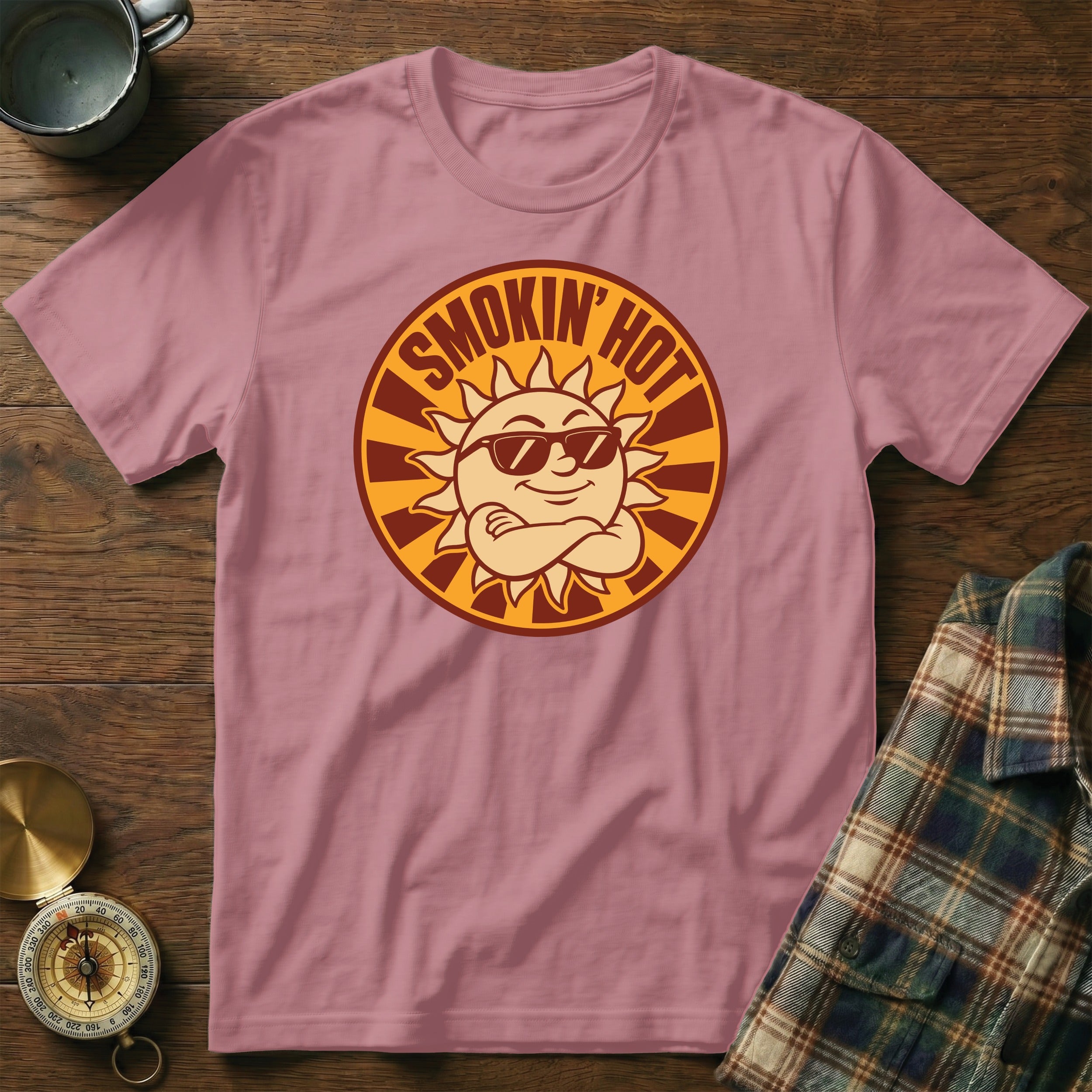 Pink t-shirt with a sun graphic that reads "SMOKIN' HOT".