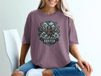 T-shirt graphic with kraken, waves, sky, and text "KRAKEN BEYOND THE DEPTHS".