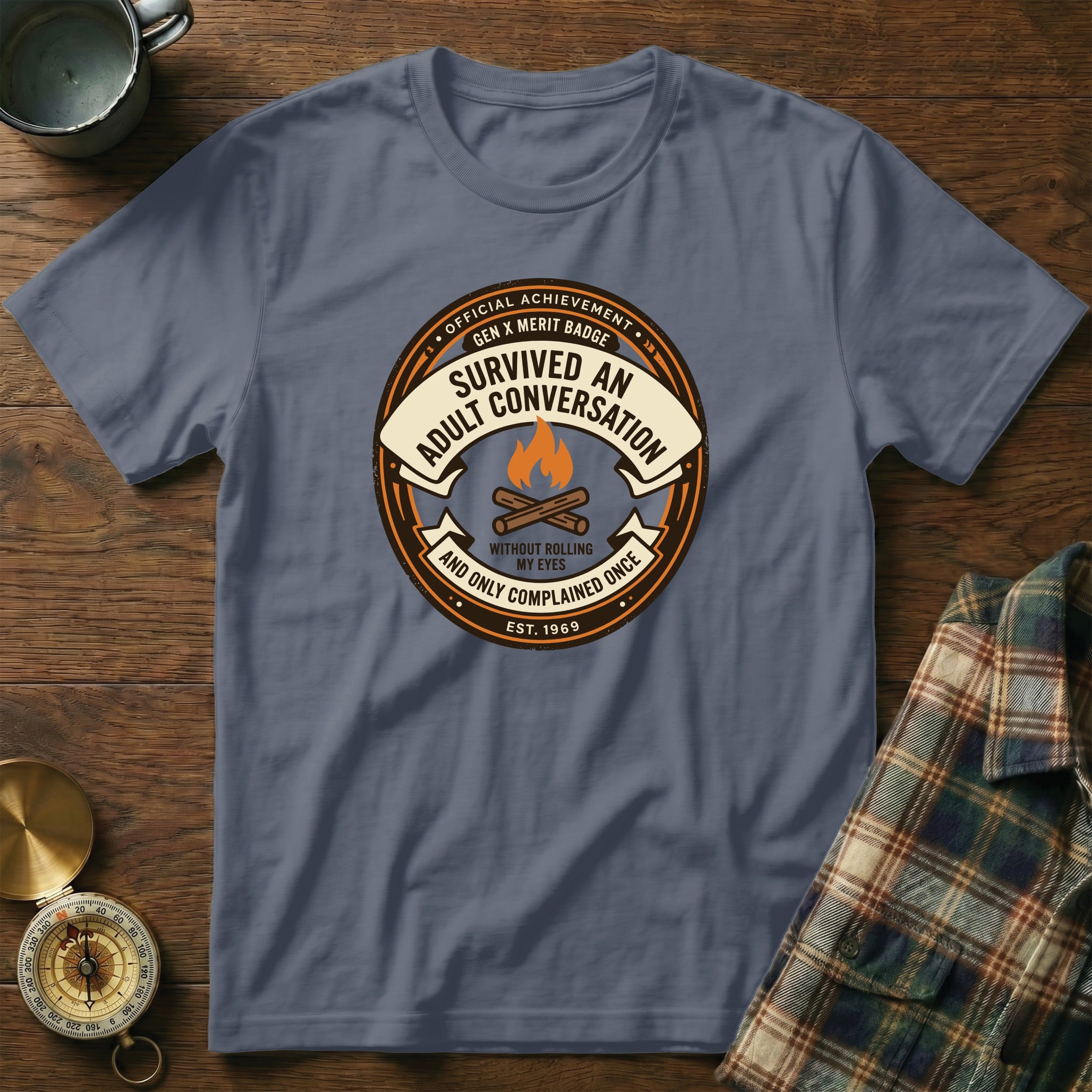 T-shirt with "Gen X Merit Badge: Survived Adult Conversation" graphic.