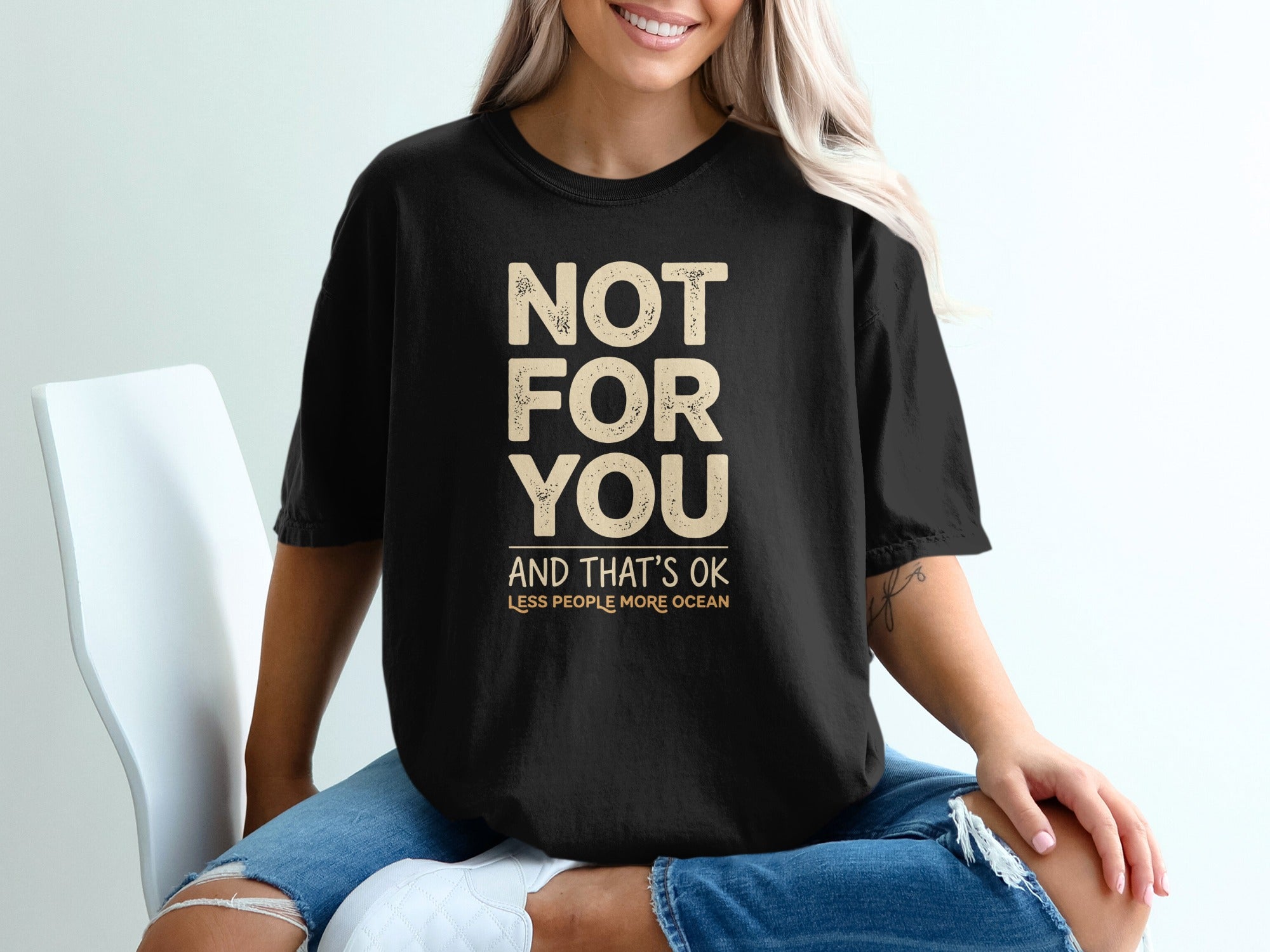 Black t-shirt with "NOT FOR YOU AND THAT'S OK LESS PEOPLE MORE OCEAN" text.
