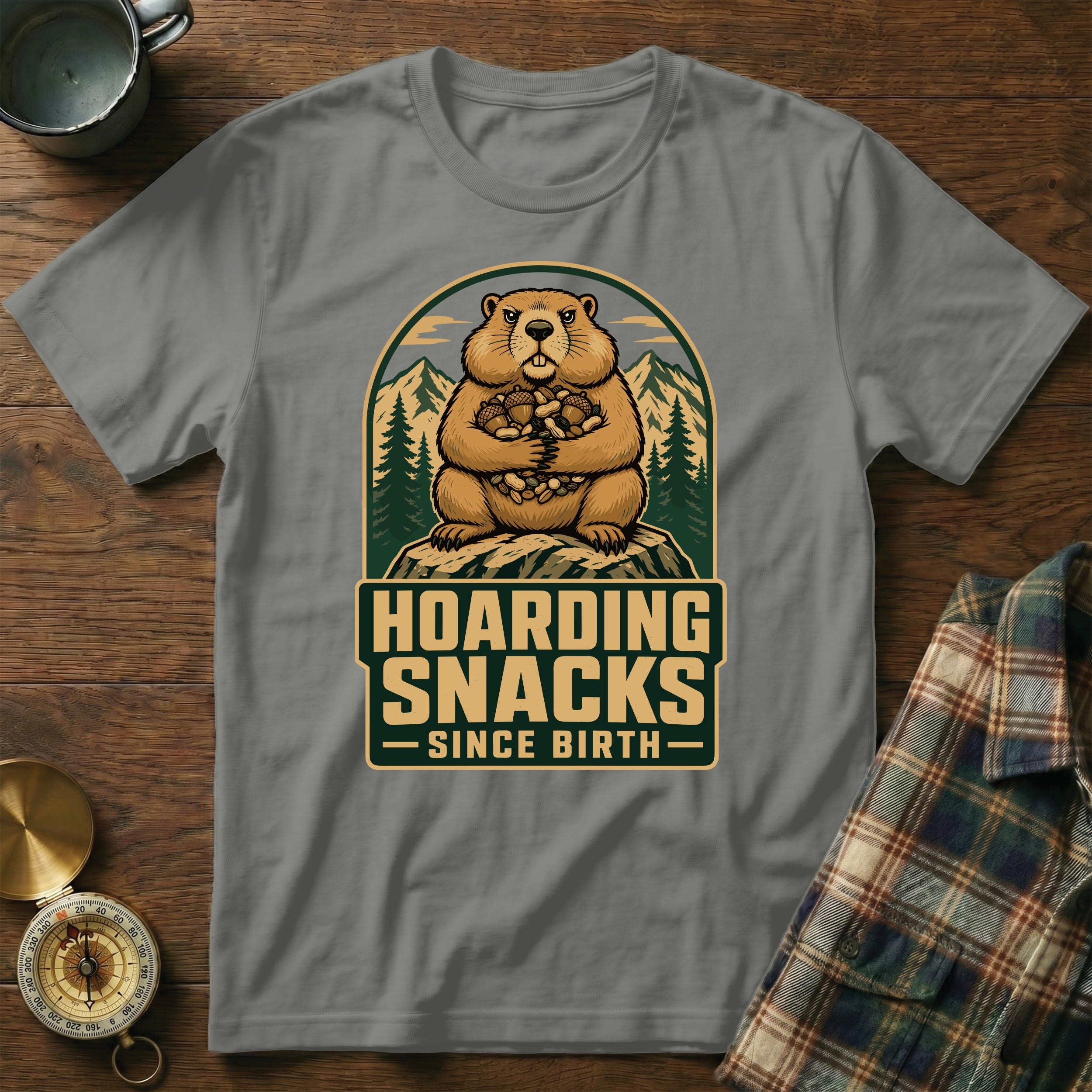 Groundhog holding nuts with "Hoarding Snacks Since Birth" text.