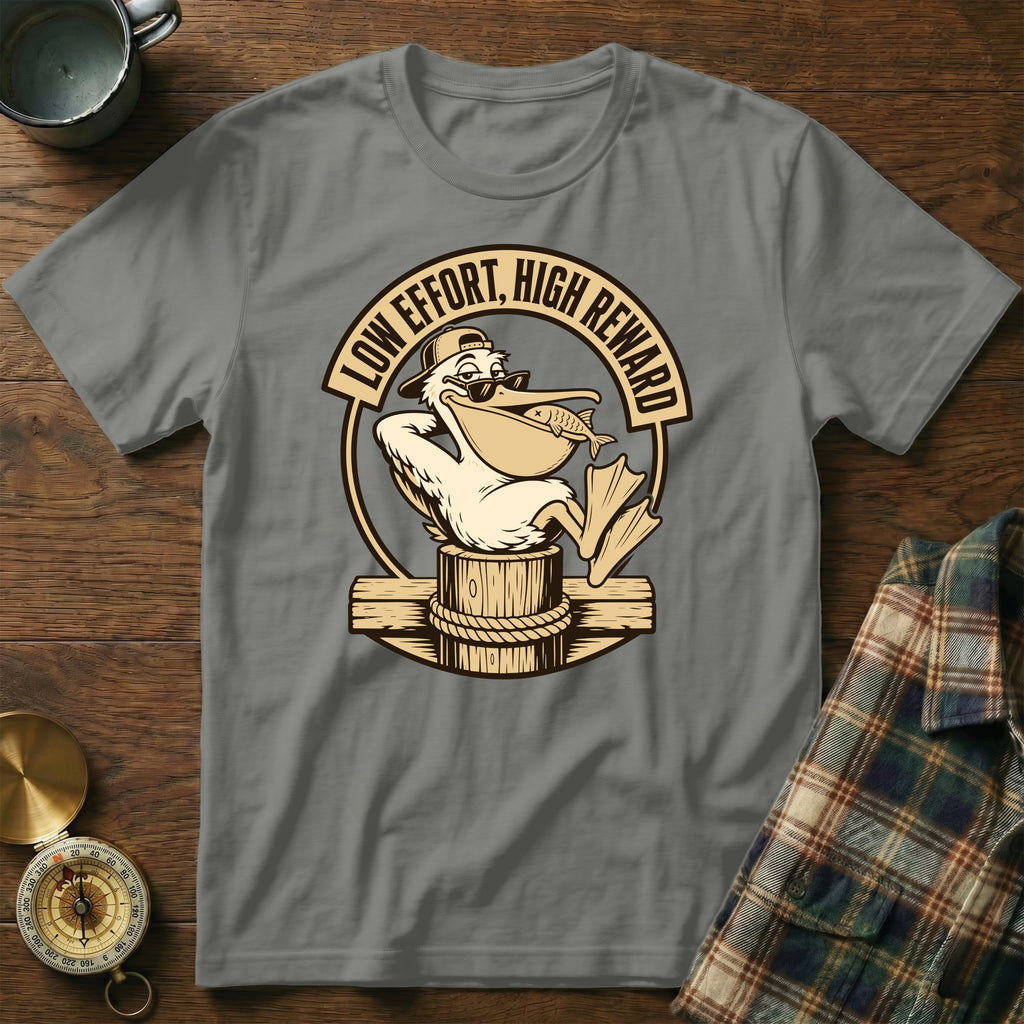 Gray t-shirt with a pelican graphic holding a fish and text "LOW EFFORT, HIGH REWARD".