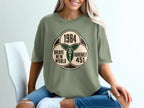 Green t-shirt with a Venn diagram design featuring "1984", "Brave New World", and "Fahrenheit 451".
