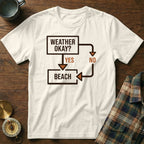 White t-shirt with "Weather Okay? Yes Beach" flowchart graphic.