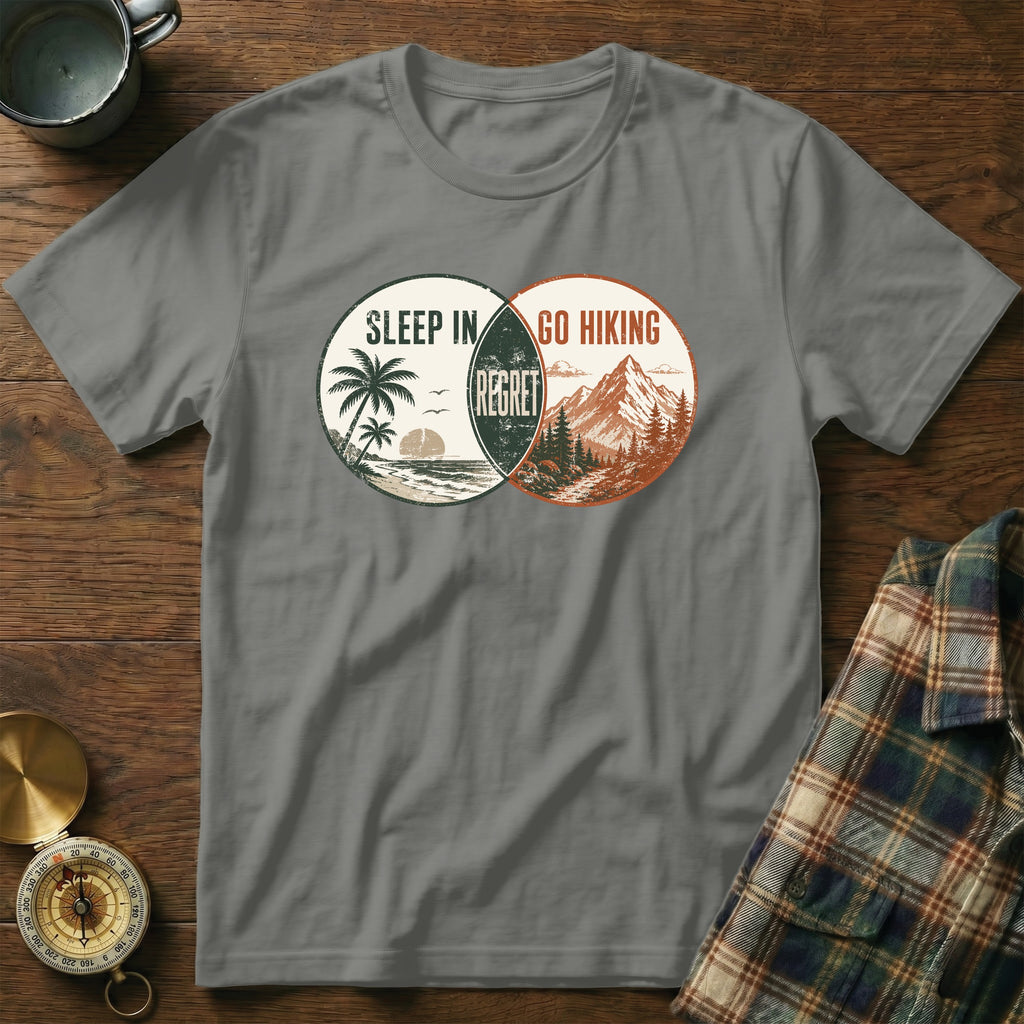 Gray t-shirt with "Sleep In Regret Go Hiking" graphic showing beach and mountain scenes.