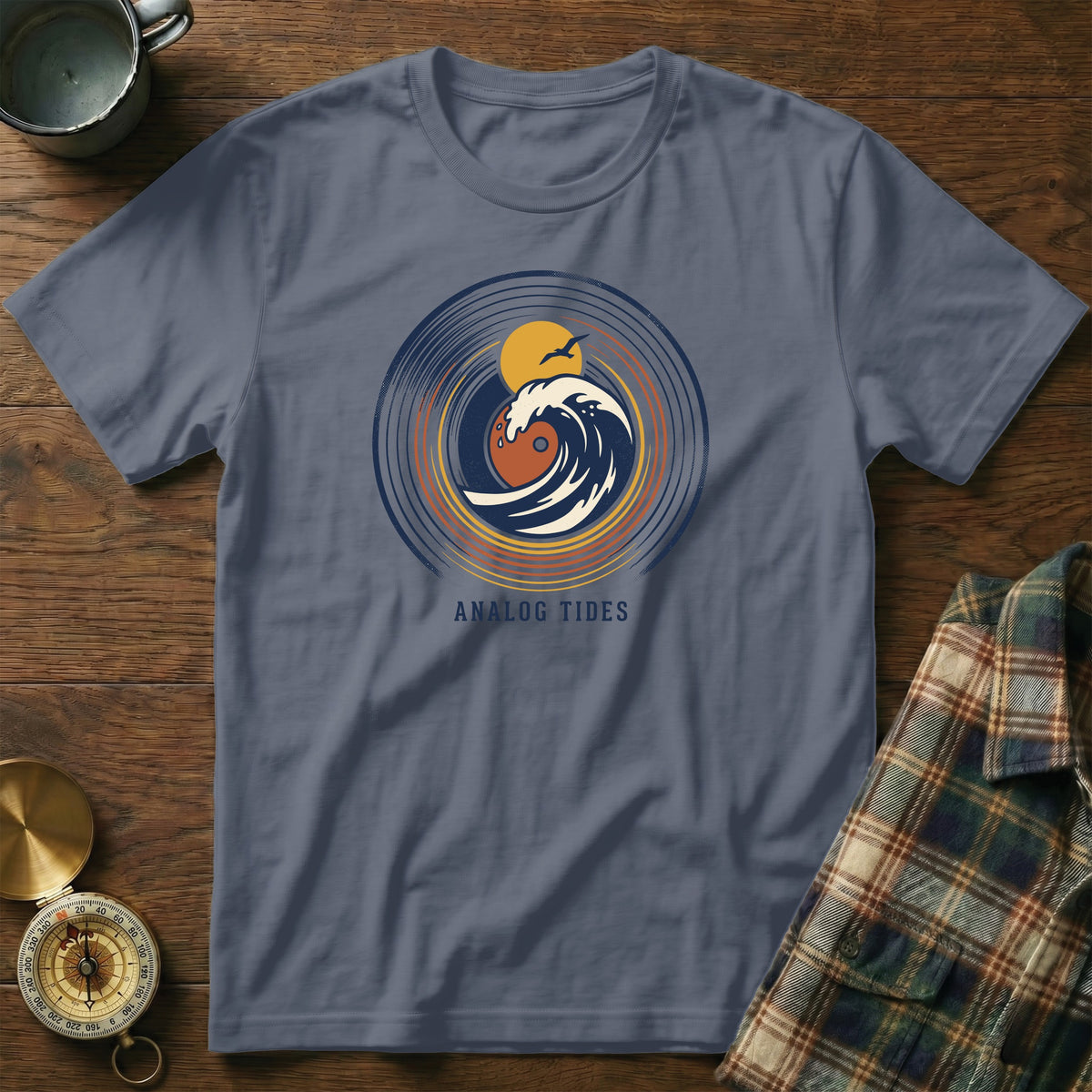 T-shirt with a circular wave and sun graphic, and "Analog Tides" text.