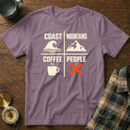Purple t-shirt with text "Coast Mountains Coffee People" and icons.