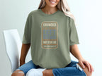 Green t-shirt with "CROWDED LEFT ANYWAY NOT FOR US YOU CAN HAVE IT" text.