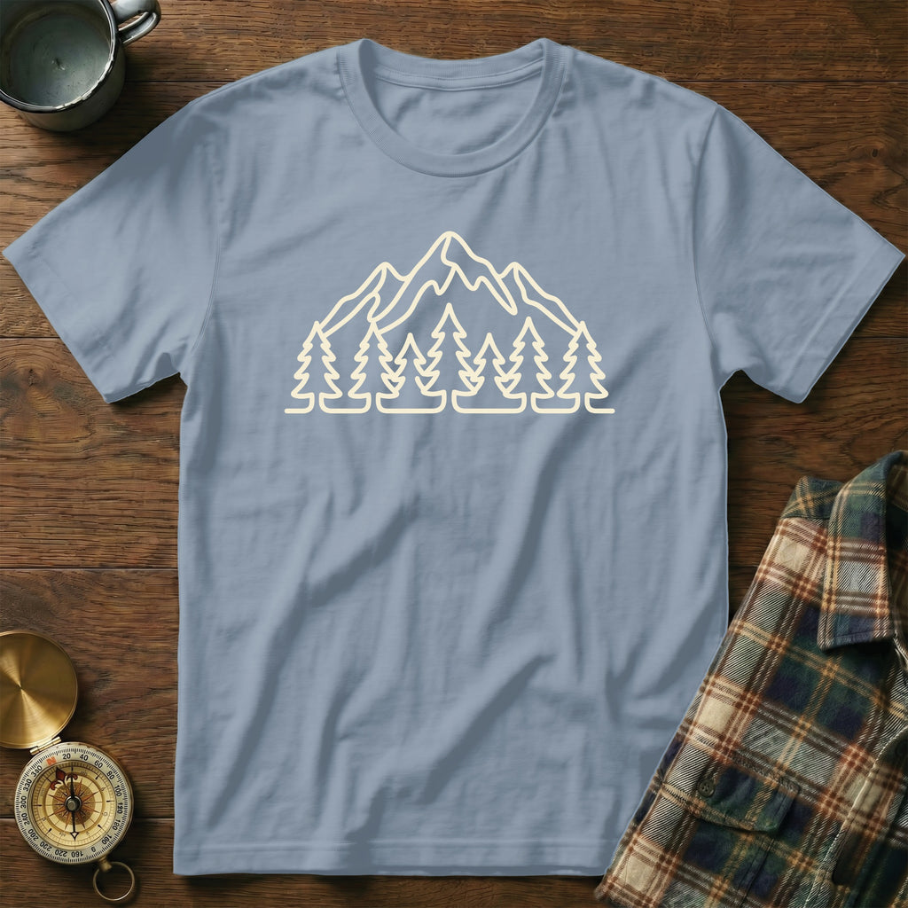 Light blue t-shirt with a cream outline of mountains and pine trees.
