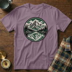 Purple t-shirt with a circular mountain landscape graphic and compass.