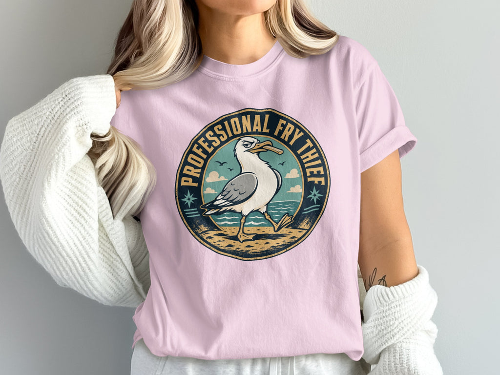 Seagull with french fry in beak and "Professional Fry Thief" text on t-shirt.