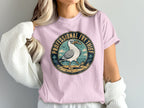 Seagull with french fry in beak and "Professional Fry Thief" text on t-shirt.
