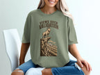 Olive green t-shirt with "Views Over Validation" text and goat on cliff graphic.