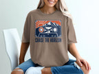 T-shirt with vintage cassette tape graphic featuring mountains, sun, and road, text reads "CHASE THE HORIZON".