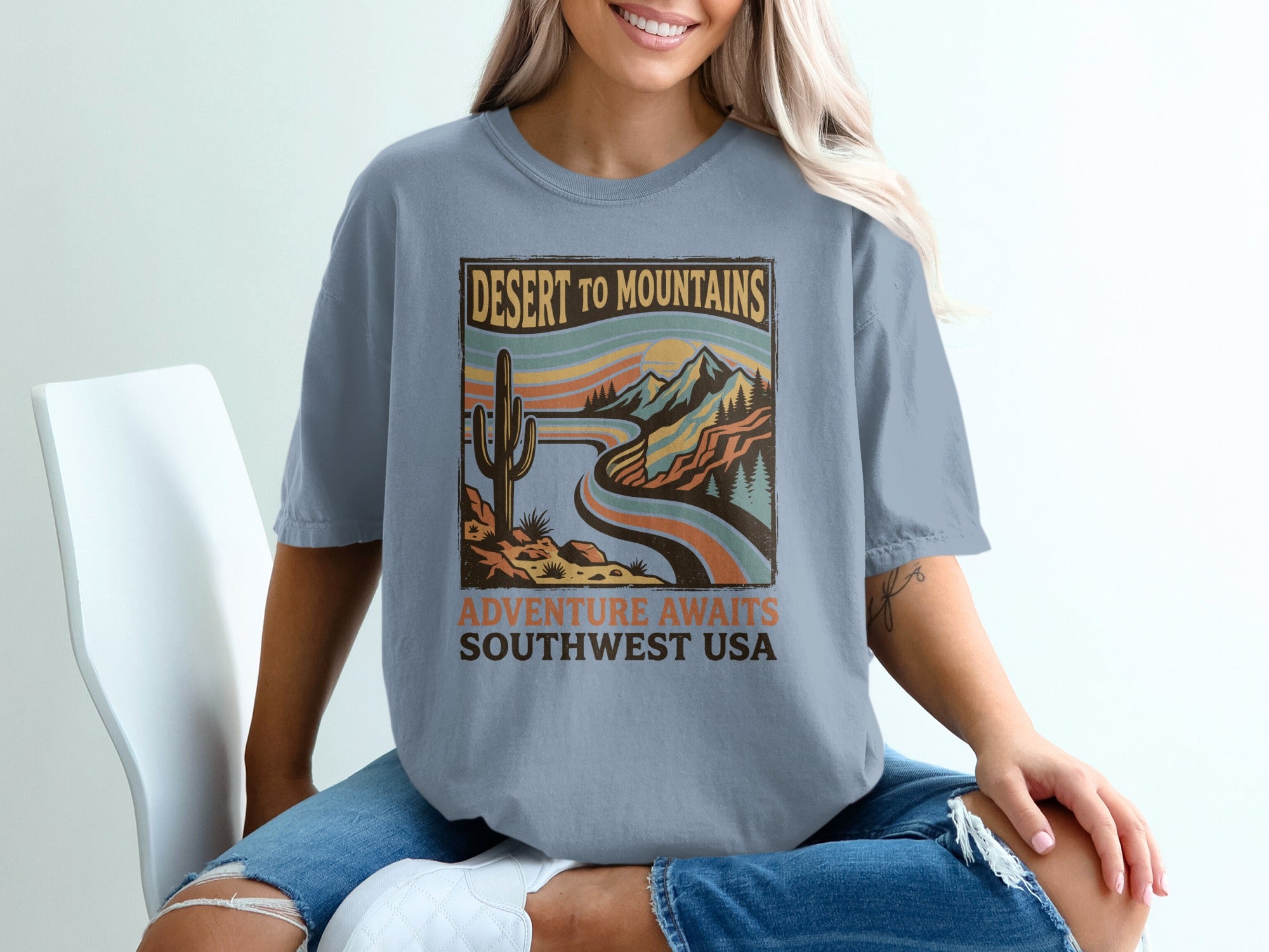 T-shirt with "Desert to Mountains Southwest USA" vintage landscape graphic.