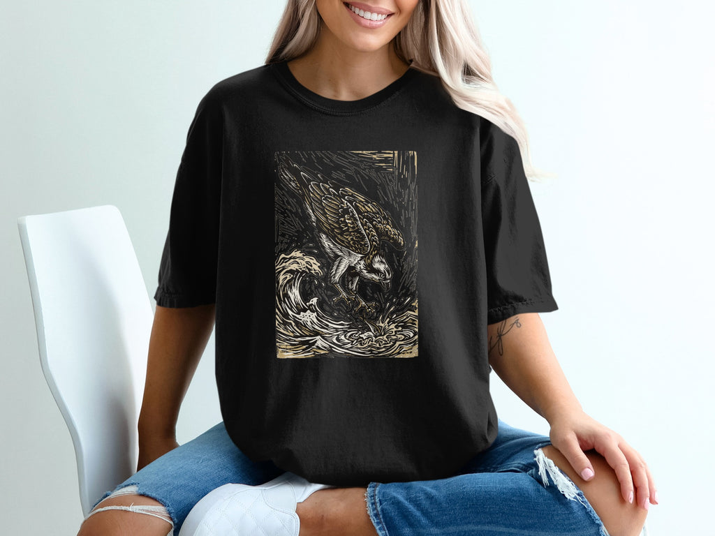 Black t-shirt with a woodcut-style eagle illustration in waves.