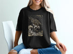 Black t-shirt with a woodcut-style eagle illustration in waves.