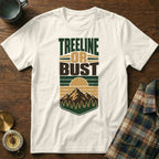 Cream t-shirt with "TREELINE OR BUST" text and mountain graphic.
