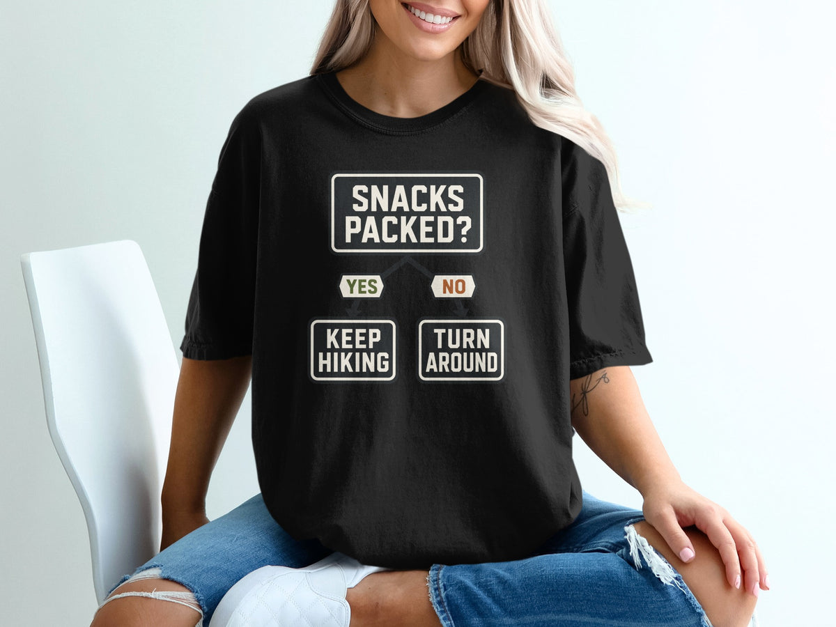 Black t-shirt with "Snacks Packed?" flowchart: "Yes" leads to "Keep Hiking," "No" leads to "Turn Around."