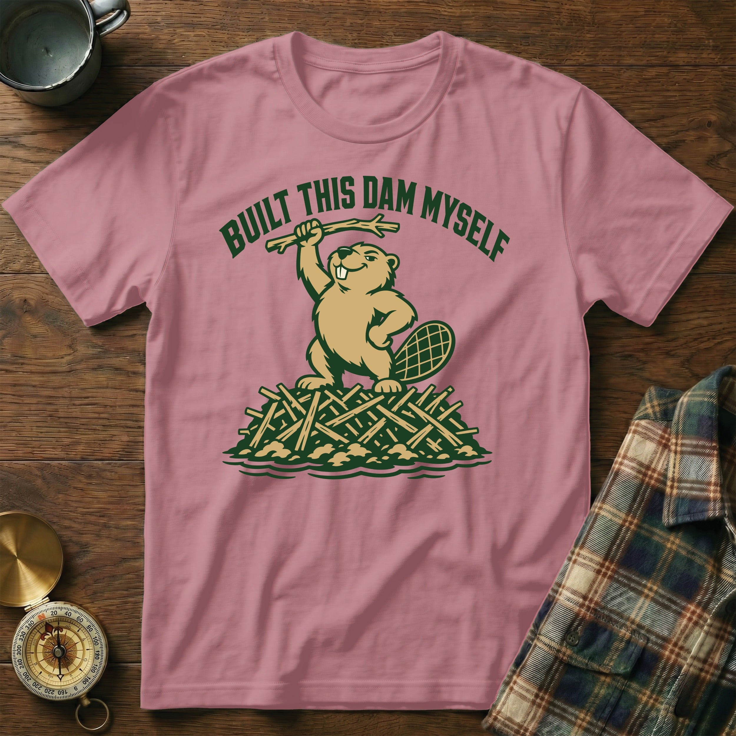 Pink t-shirt with a beaver holding a stick, text "BUILT THIS DAM MYSELF".