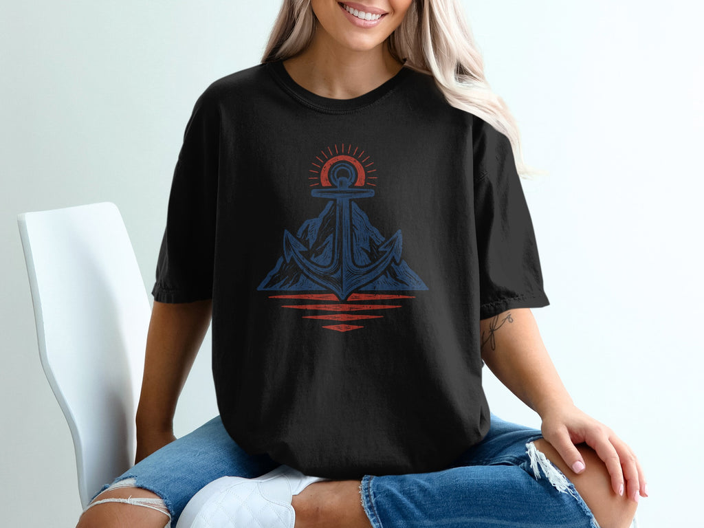 Black t-shirt with blue and red anchor, mountain, and sun graphic.