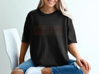 Black t-shirt with "LIBERTY LOOKS GOOD ON YOU" text.
