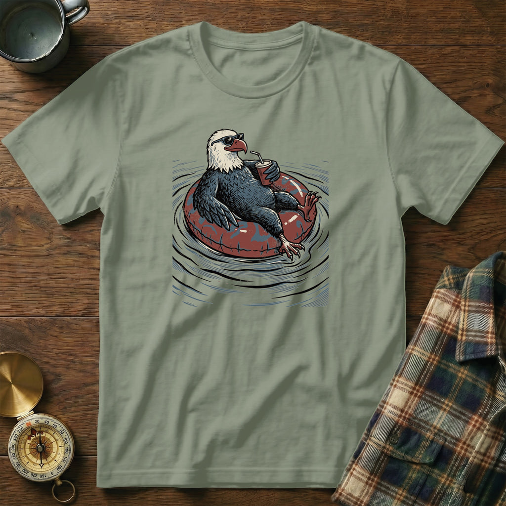 Bald eagle wearing sunglasses on an inner tube, drinking from a cup.