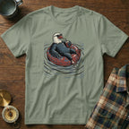 Bald eagle wearing sunglasses on an inner tube, drinking from a cup.