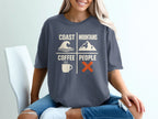 T-shirt graphic with text: Coast Mountains Coffee People, wave, mountain, coffee cup, orange X.