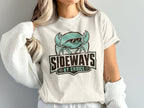 White t-shirt with a teal crab wearing sunglasses and the text "SIDEWAYS BY CHOICE".