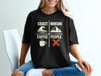 Black t-shirt with "Coast Mountains Coffee People" and four icons: wave, mountain, coffee cup, X.