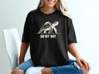 Black t-shirt with graphic of a turtle with a backpack and text "ON MY WAY".